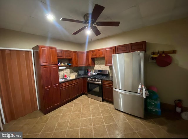813 E Russell St, Philadelphia, PA 19134 - kitchen with appliances with stainless steel finishes, dark countertops, a ceiling fan, backsplash, and open shelves