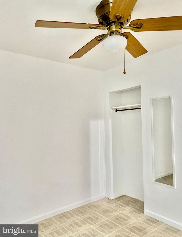 813 E Russell St, Philadelphia, PA 19134 - unfurnished bedroom featuring a ceiling fan, a closet, and baseboards