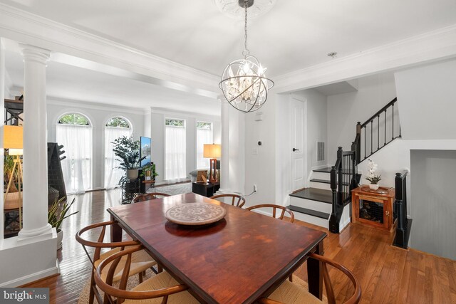 5016 Gardner Dr, Alexandria, VA 22304 - dining area with healthy amount of natural light, wood finished floors, stairway, crown molding, and ornate columns