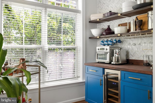 5016 Gardner Dr, Alexandria, VA 22304 - indoor dry bar with beverage cooler, tasteful backsplash, and healthy amount of natural light