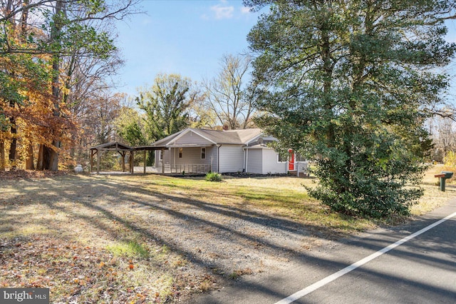 901 Chesterfield Rd, Annapolis, MD 21401 - view of home's exterior featuring a carport, driveway, a lawn, and a gazebo