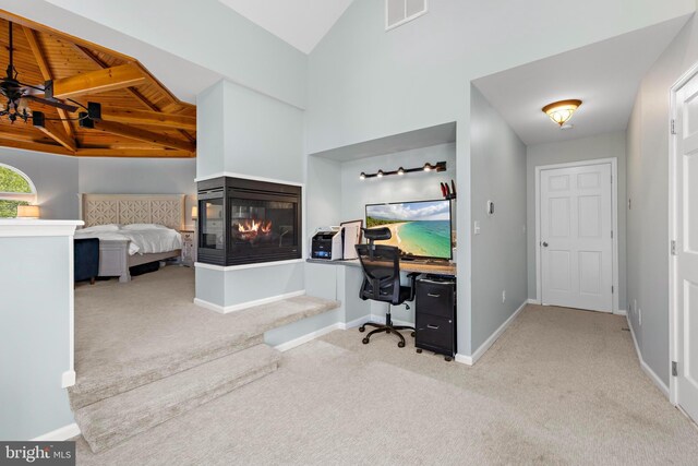 115 Holly Ct, Tuckerton, NJ 08087 - carpeted bedroom featuring a desk, baseboards, a multi sided fireplace, and wood ceiling