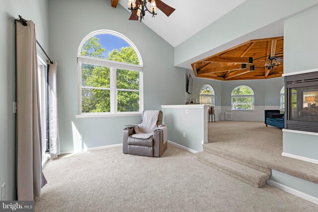 115 Holly Ct, Tuckerton, NJ 08087 - living area featuring high vaulted ceiling, beam ceiling, carpet flooring, an upstairs landing, and a ceiling fan