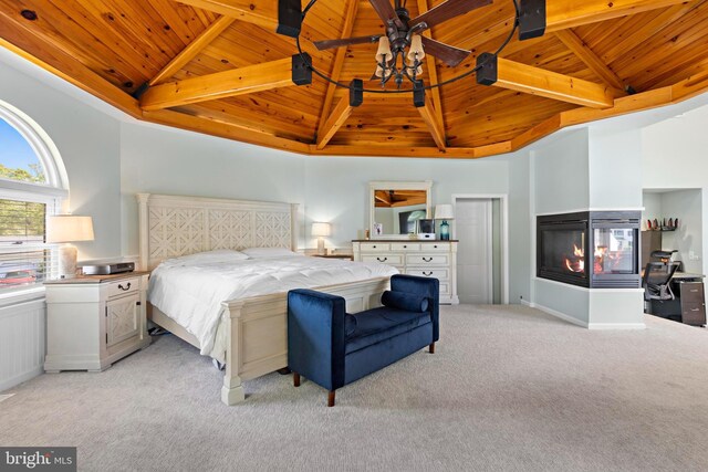 115 Holly Ct, Tuckerton, NJ 08087 - bedroom featuring wooden ceiling, a multi sided fireplace, light colored carpet, beamed ceiling, and high vaulted ceiling