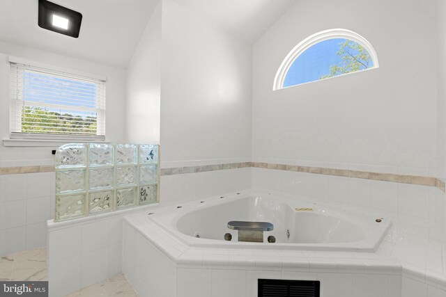 115 Holly Ct, Tuckerton, NJ 08087 - bathroom with plenty of natural light, lofted ceiling, and a tub with jets