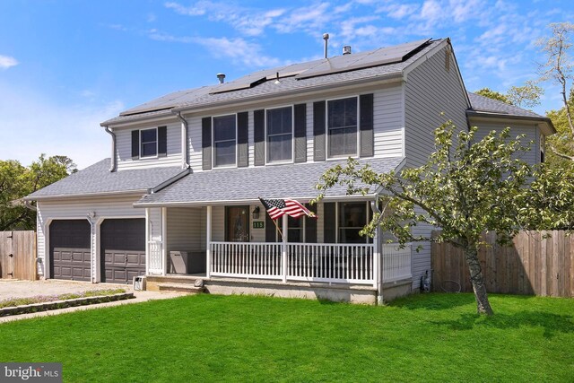 115 Holly Ct, Tuckerton, NJ 08087 - view of front facade with a porch, solar panels, roof with shingles, and driveway