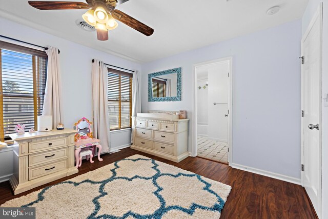 115 Holly Ct, Tuckerton, NJ 08087 - bedroom with dark wood finished floors, baseboards, ceiling fan, and ensuite bath