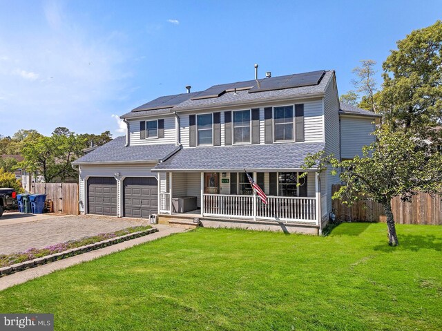 115 Holly Ct, Tuckerton, NJ 08087 - traditional-style home featuring a porch, driveway, roof mounted solar panels, and a garage