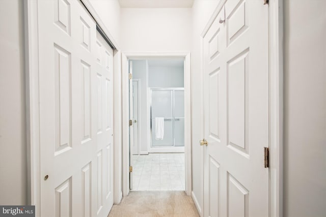 2604 Chapel Lake Dr Unit 107, Gambrills, MD 21054 - hallway with light colored carpet and baseboards