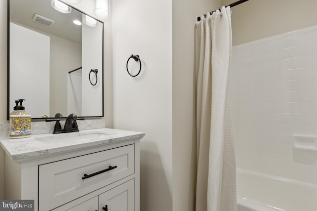 7879 Wintercress Ln, Springfield, VA 22152 - bathroom featuring shower / bath combo with shower curtain and vanity