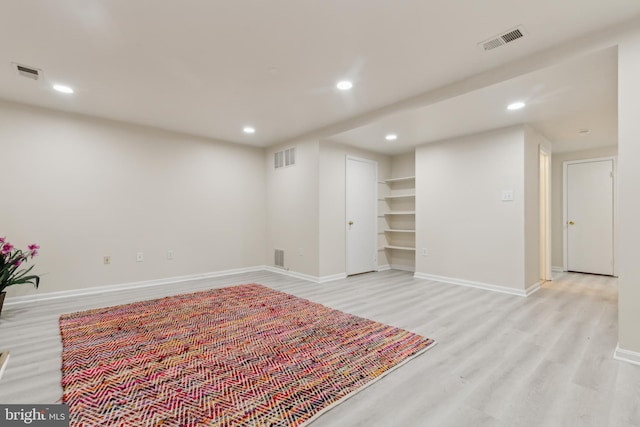 7879 Wintercress Ln, Springfield, VA 22152 - finished below grade area featuring light wood-style floors, baseboards, and recessed lighting