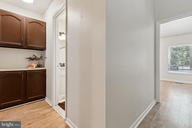 7879 Wintercress Ln, Springfield, VA 22152 - corridor with light wood-type flooring and baseboards