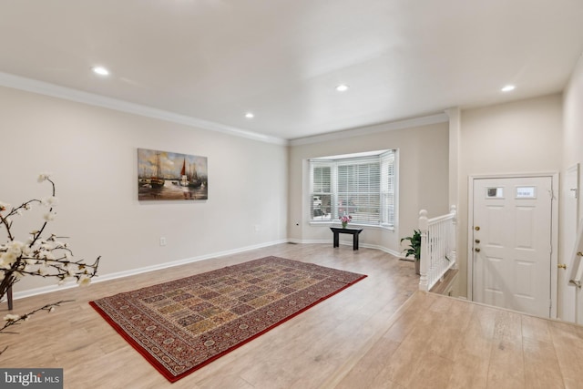 7879 Wintercress Ln, Springfield, VA 22152 - foyer with wood finished floors, recessed lighting, crown molding, and baseboards