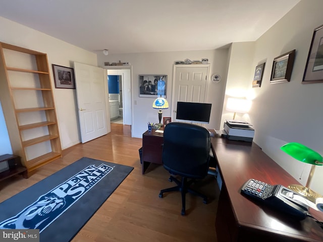 office area with wood finished floors