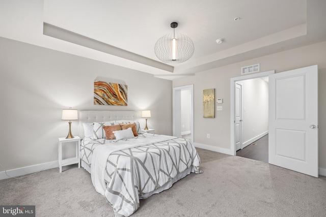 1334 S Quinn St, Arlington, VA 22204 - carpeted bedroom featuring a tray ceiling and baseboards