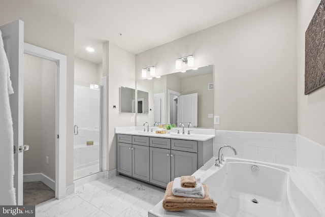 1334 S Quinn St, Arlington, VA 22204 - bathroom with a bath, a shower stall, double vanity, marble look tiles, and baseboards