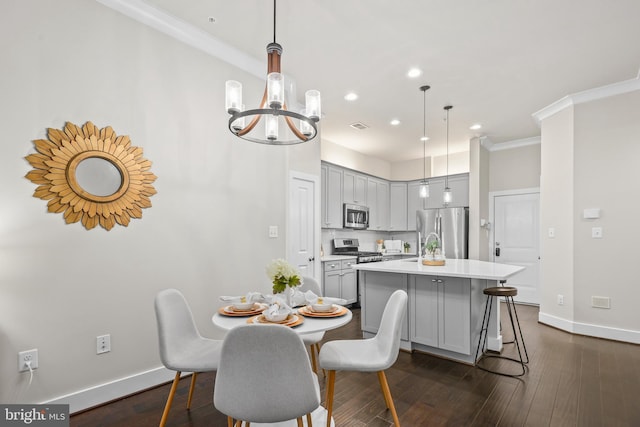 1334 S Quinn St, Arlington, VA 22204 - dining area featuring a chandelier, baseboards, dark wood-type flooring, crown molding, and recessed lighting