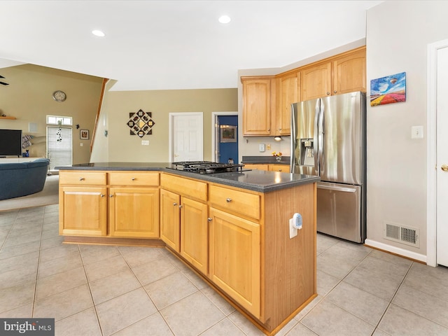 109 Galyn Dr, Brunswick, MD 21758 - kitchen featuring stainless steel refrigerator with ice dispenser, gas cooktop, open floor plan, light tile patterned flooring, and a center island