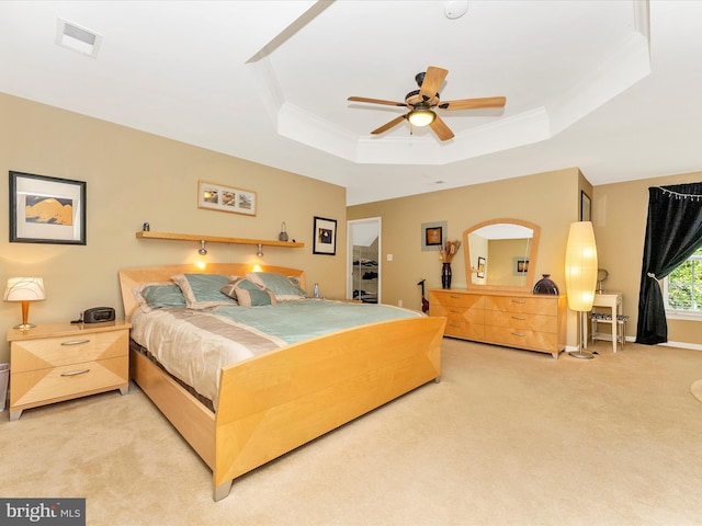 109 Galyn Dr, Brunswick, MD 21758 - bedroom with light carpet, a tray ceiling, ornamental molding, and a ceiling fan