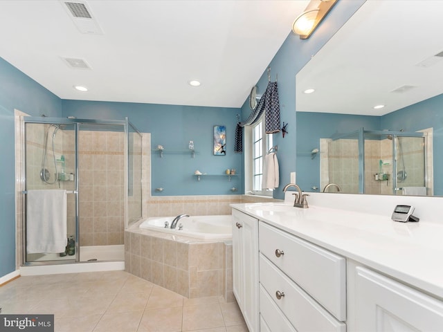 109 Galyn Dr, Brunswick, MD 21758 - full bathroom with a bath, a shower stall, vanity, tile patterned flooring, and recessed lighting