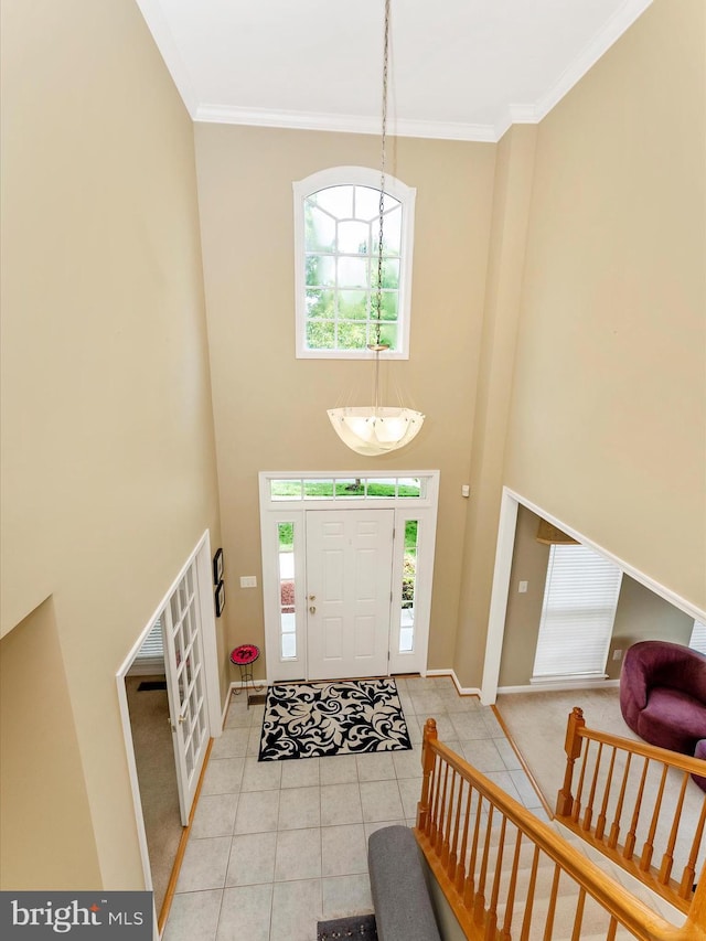 109 Galyn Dr, Brunswick, MD 21758 - foyer entrance with healthy amount of natural light, a high ceiling, tile patterned flooring, baseboards, and a chandelier