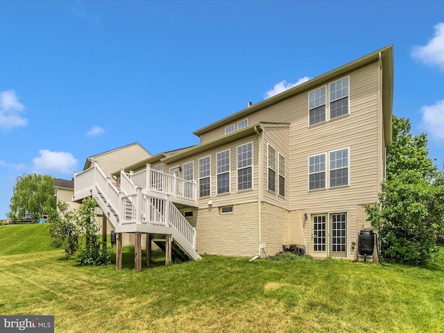 109 Galyn Dr, Brunswick, MD 21758 - rear view of property with stairway, a yard, and a wooden deck