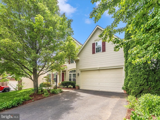 109 Galyn Dr, Brunswick, MD 21758 - view of front of house featuring asphalt driveway and an attached garage