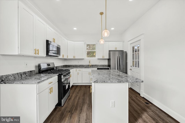 1127 Chesaco Ave, Rosedale, MD 21237 - kitchen with appliances with stainless steel finishes, a sink, white cabinetry, recessed lighting, and dark wood finished floors
