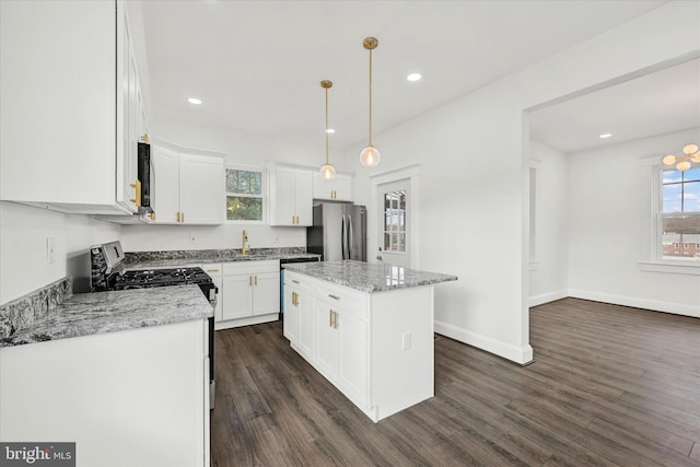 1127 Chesaco Ave, Rosedale, MD 21237 - kitchen with stainless steel appliances, dark wood finished floors, white cabinets, and recessed lighting