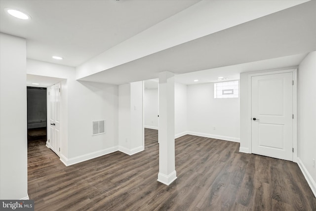 1127 Chesaco Ave, Rosedale, MD 21237 - basement featuring dark wood-style flooring, baseboards, recessed lighting, and baseboard heating
