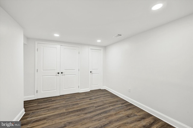 1127 Chesaco Ave, Rosedale, MD 21237 - unfurnished bedroom with dark wood-style floors, baseboards, recessed lighting, and a closet