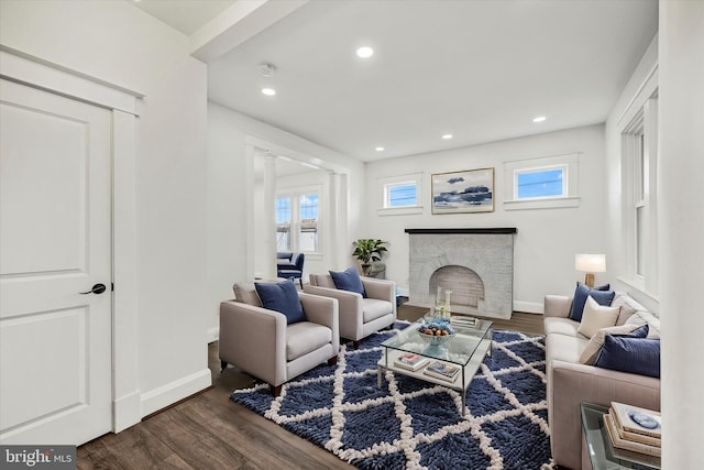 1127 Chesaco Ave, Rosedale, MD 21237 - living room with dark wood-style flooring, baseboards, recessed lighting, and a fireplace