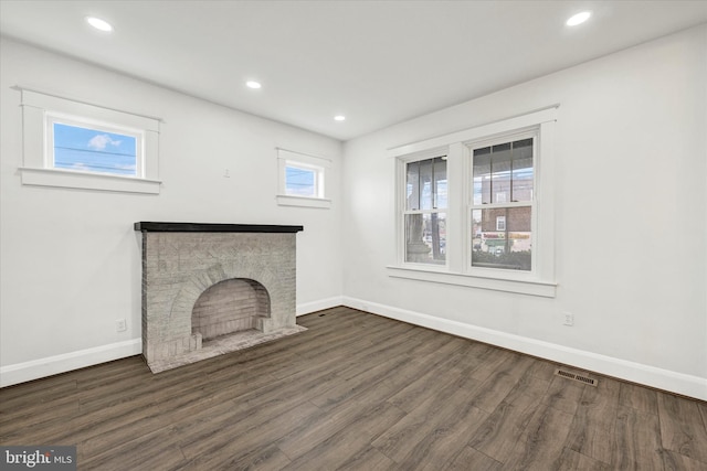 1127 Chesaco Ave, Rosedale, MD 21237 - unfurnished living room featuring baseboards, wood finished floors, recessed lighting, and a fireplace with flush hearth