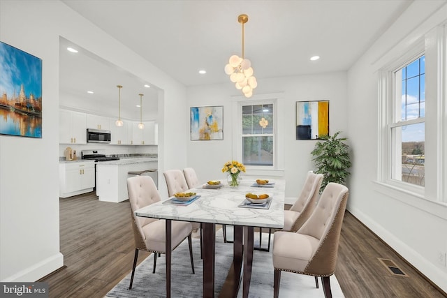 1127 Chesaco Ave, Rosedale, MD 21237 - dining room with dark wood finished floors, recessed lighting, and baseboards