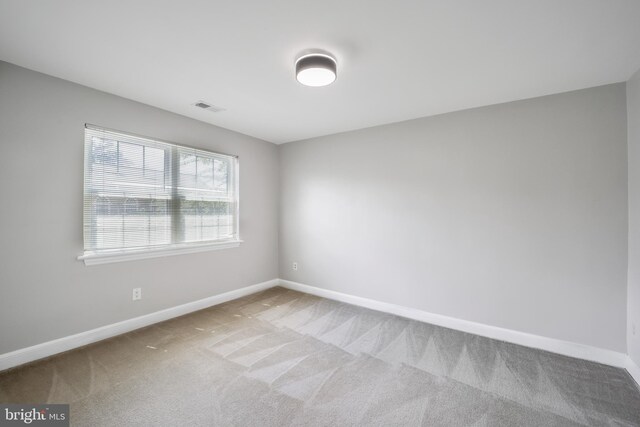 2101 N Taft St Unit 123, Arlington, VA 22201 - carpeted empty room featuring baseboards