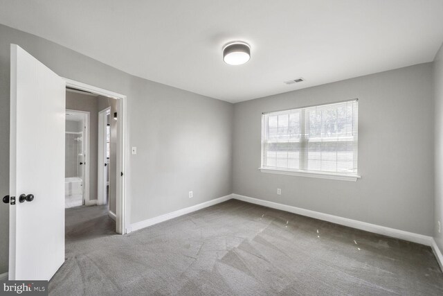 2101 N Taft St Unit 123, Arlington, VA 22201 - carpeted empty room with baseboards