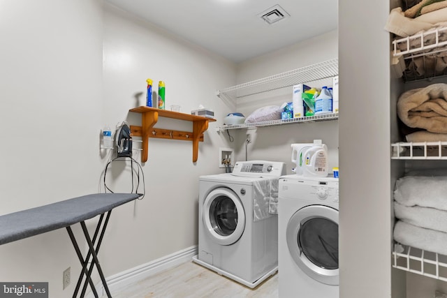 115 Diller Rd, New Cumberland, PA 17070 - washroom featuring washer and clothes dryer, wood finished floors, and baseboards
