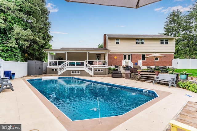 115 Diller Rd, New Cumberland, PA 17070 - view of pool featuring stairway, a fenced backyard, a patio, and a wooden deck