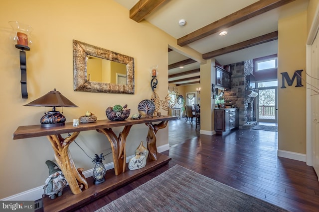 hall featuring beam ceiling, wood-type flooring, baseboards, and recessed lighting