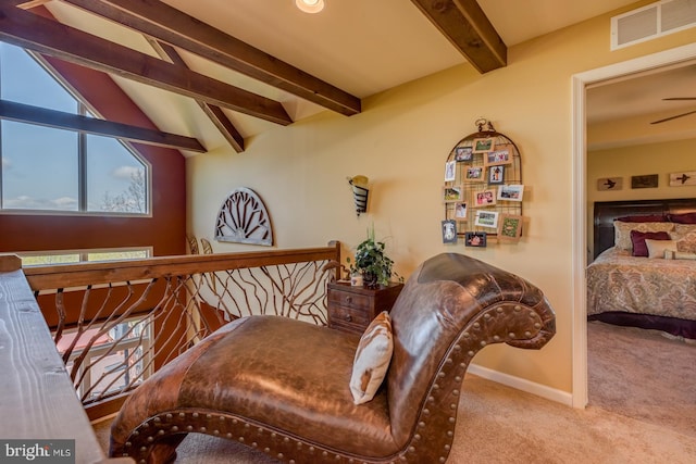 living area with carpet flooring and baseboards