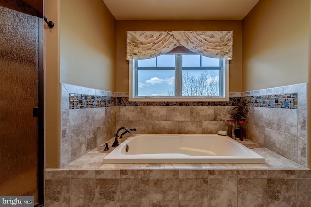 bathroom featuring a garden tub