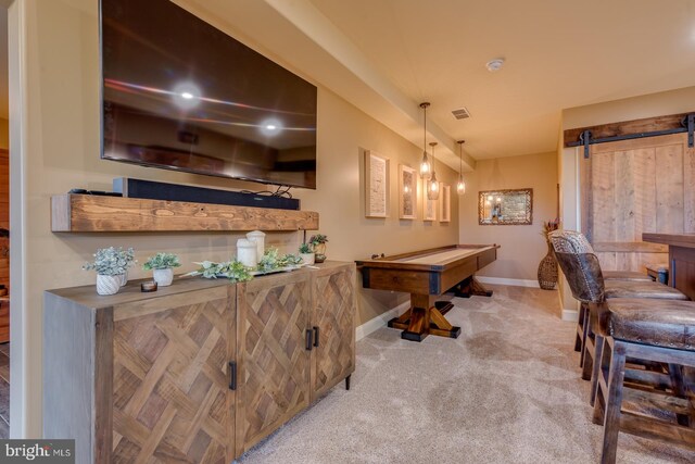 playroom with carpet flooring, baseboards, a barn door, and billiards