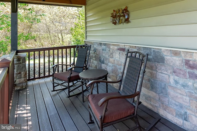 wooden terrace featuring a porch