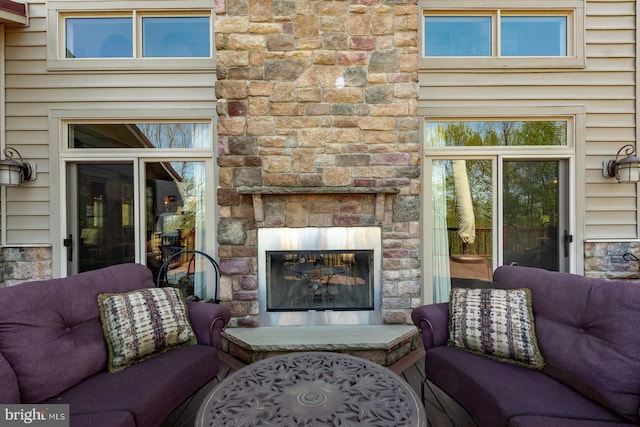 living room featuring a fireplace