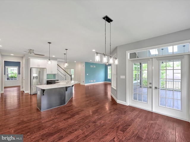 226 Crimson Ln, Elizabethtown, PA 17022 - kitchen with stainless steel fridge with ice dispenser, baseboards, light countertops, dark wood-style floors, and recessed lighting
