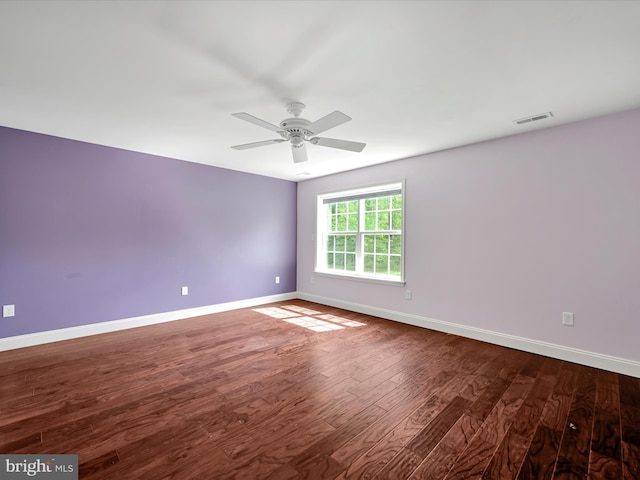 226 Crimson Ln, Elizabethtown, PA 17022 - unfurnished room featuring baseboards, dark wood-style floors, and a ceiling fan