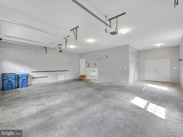 226 Crimson Ln, Elizabethtown, PA 17022 - garage with a garage door opener and a sink