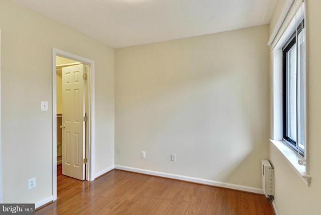 146 Monroe St Unit 101, Rockville, MD 20850 - unfurnished room featuring wood finished floors and baseboards