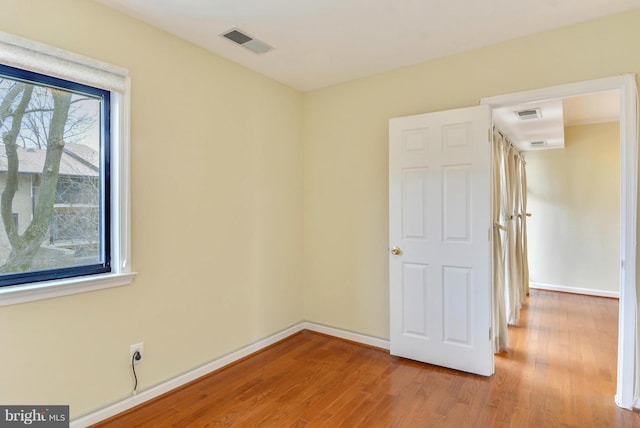146 Monroe St Unit 101, Rockville, MD 20850 - empty room featuring wood finished floors and baseboards