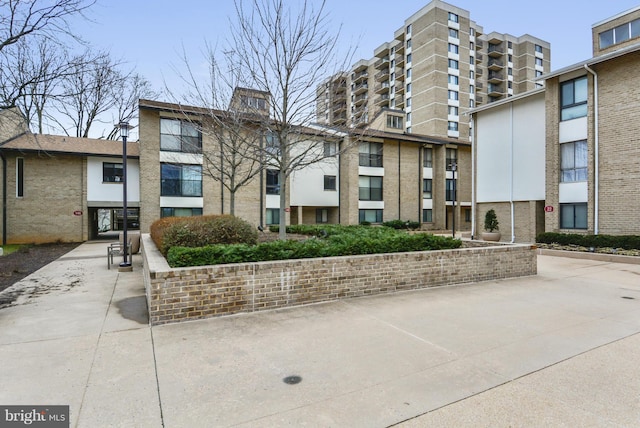 146 Monroe St Unit 101, Rockville, MD 20850 - view of apartment building / complex